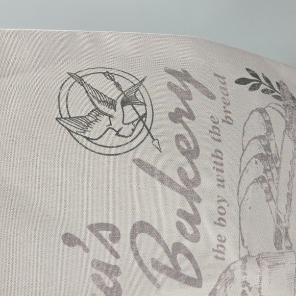 The Hunger Games Peeta's Bakery Cream Tote Bag - Picture 7 of 16